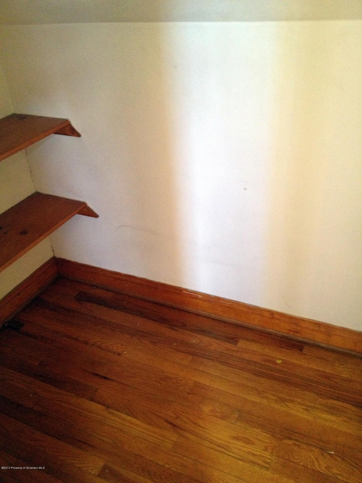 125 Corcoran Street Old Forge, PA 18518 - Photo 20 of 36 a view of small space with wooden floor