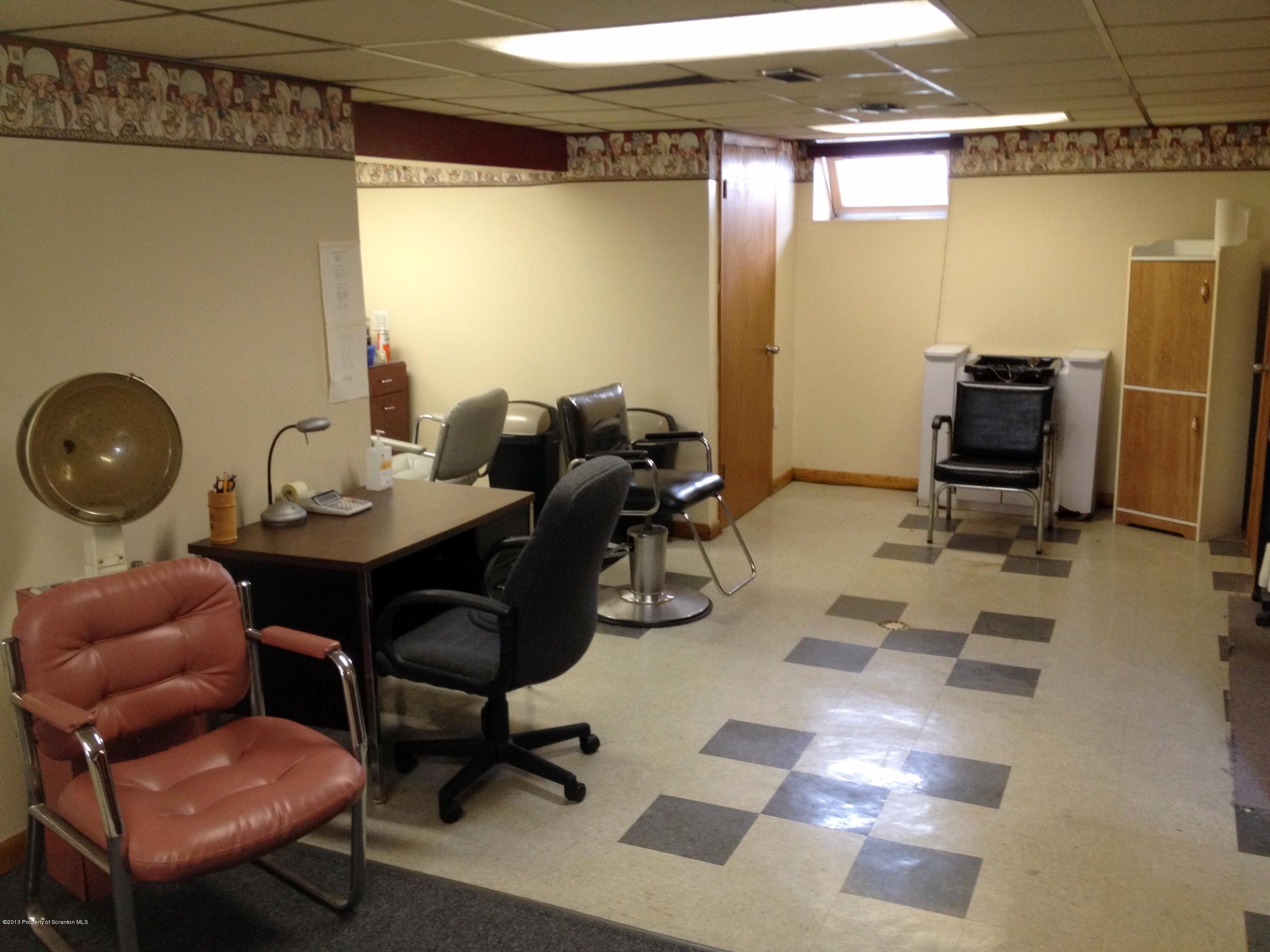 125 Corcoran Street Old Forge, PA 18518 - Photo 22 of 36 a work room with furniture and a window