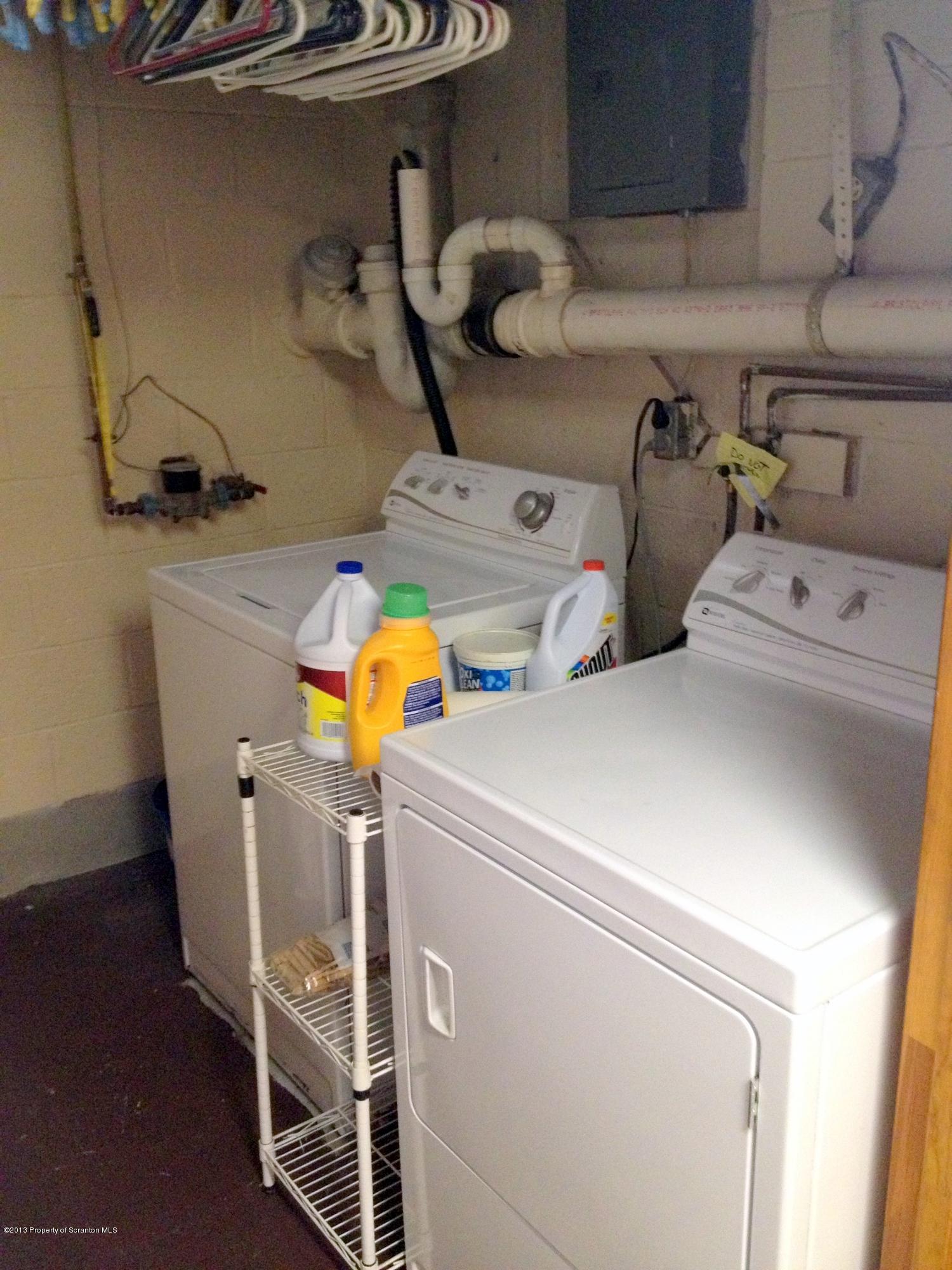 125 Corcoran Street Old Forge, PA 18518 - Photo 26 of 36 a utility room with dryer and washer