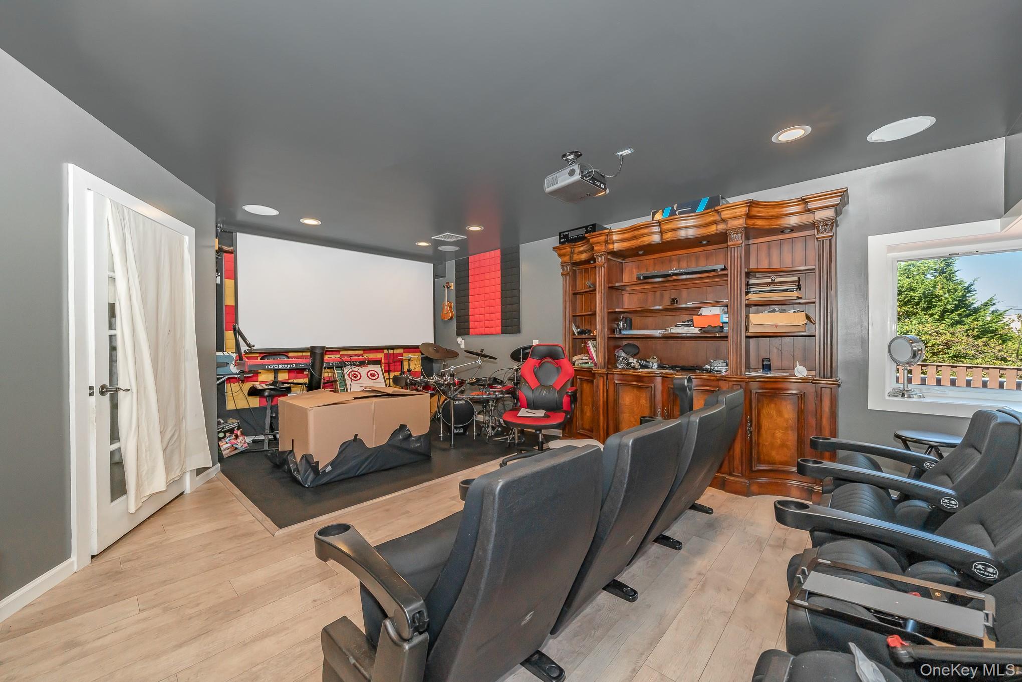 28 Riverside Avenue Amityville, NY 11701 - Photo 16 of 31 a view of a room with gym equipment