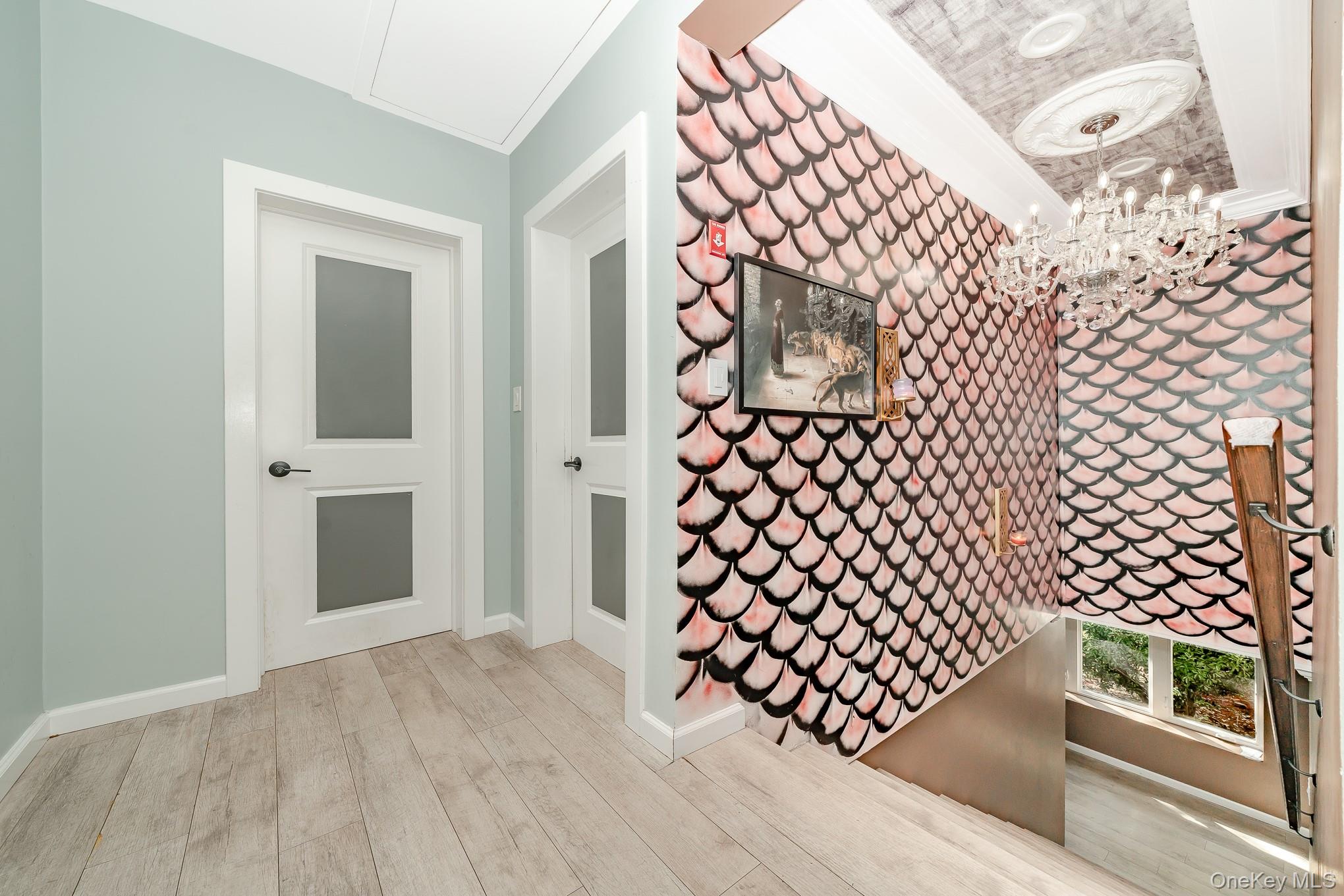 28 Riverside Avenue Amityville, NY 11701 - Photo 20 of 31 a view of entryway with wooden floor