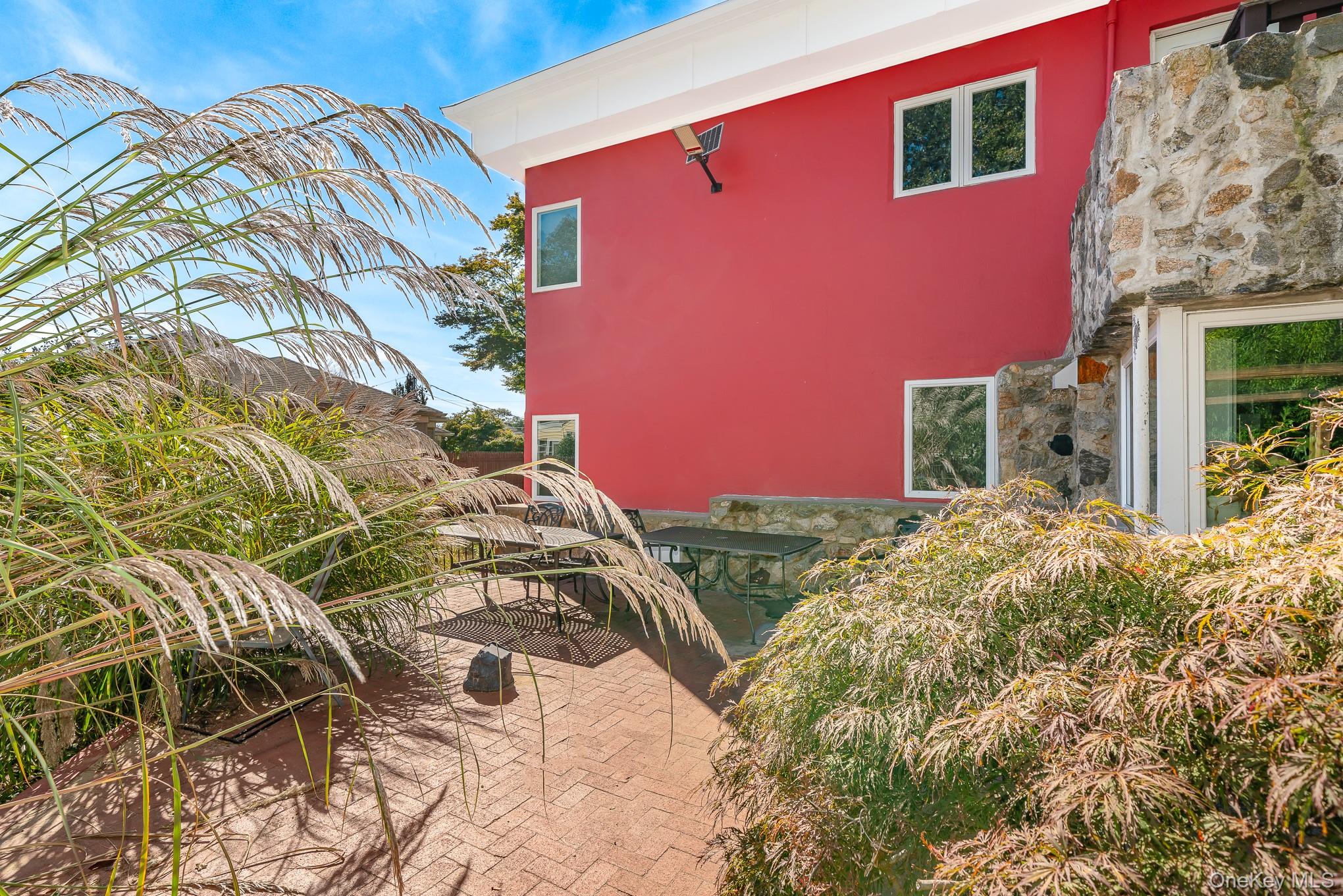 28 Riverside Avenue Amityville, NY 11701 - Photo 24 of 31 a front view of a house with a yard