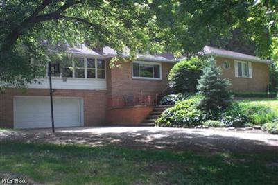 7051 Canal Road Valley View, OH 44125 - Photo 1 of 1 Brick Ranch - Set back from the road.