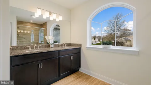 a bathroom with a shower and a toilet