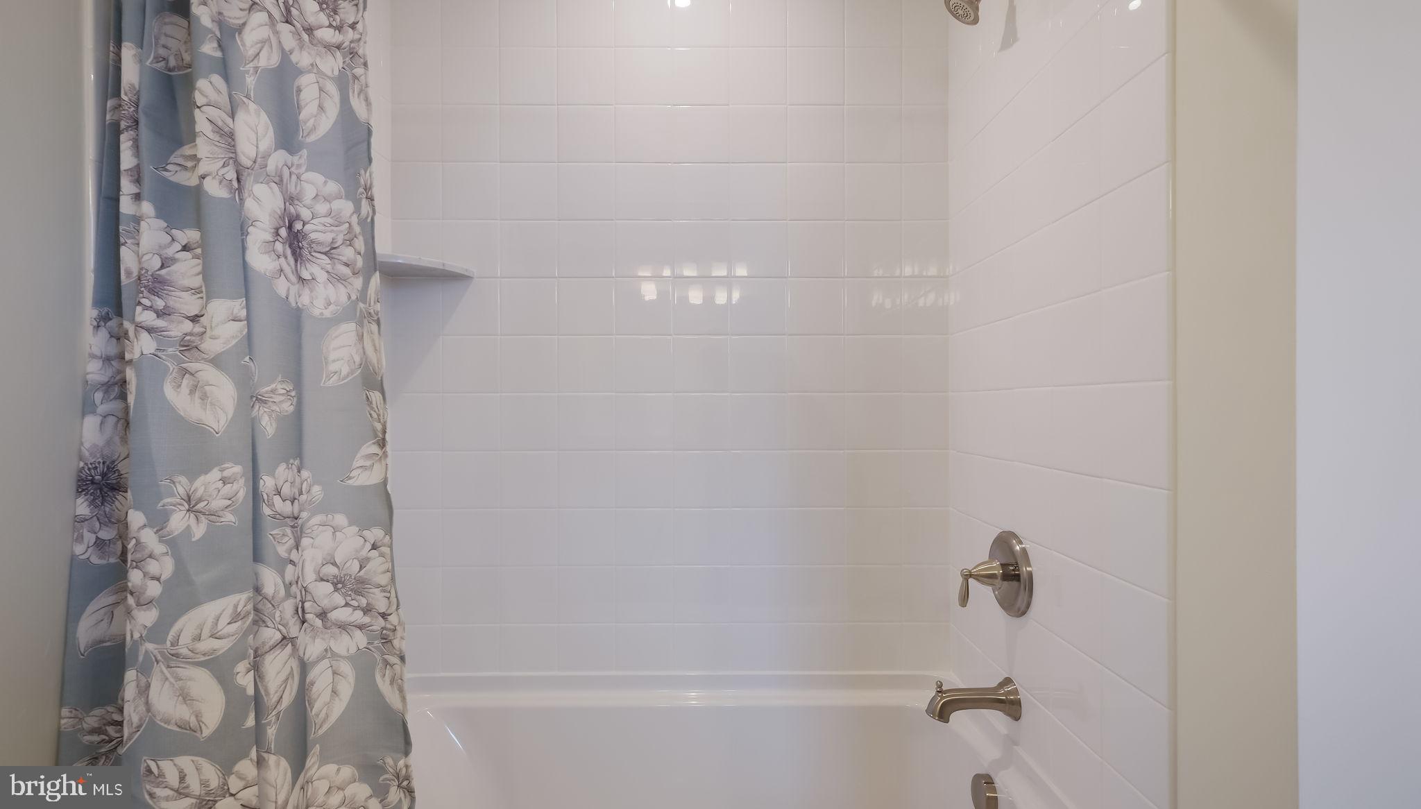 321 Green Top Road, Unit 7 Quakertown, PA 18951 - Photo 41 of 41 a bathroom with a bathtub