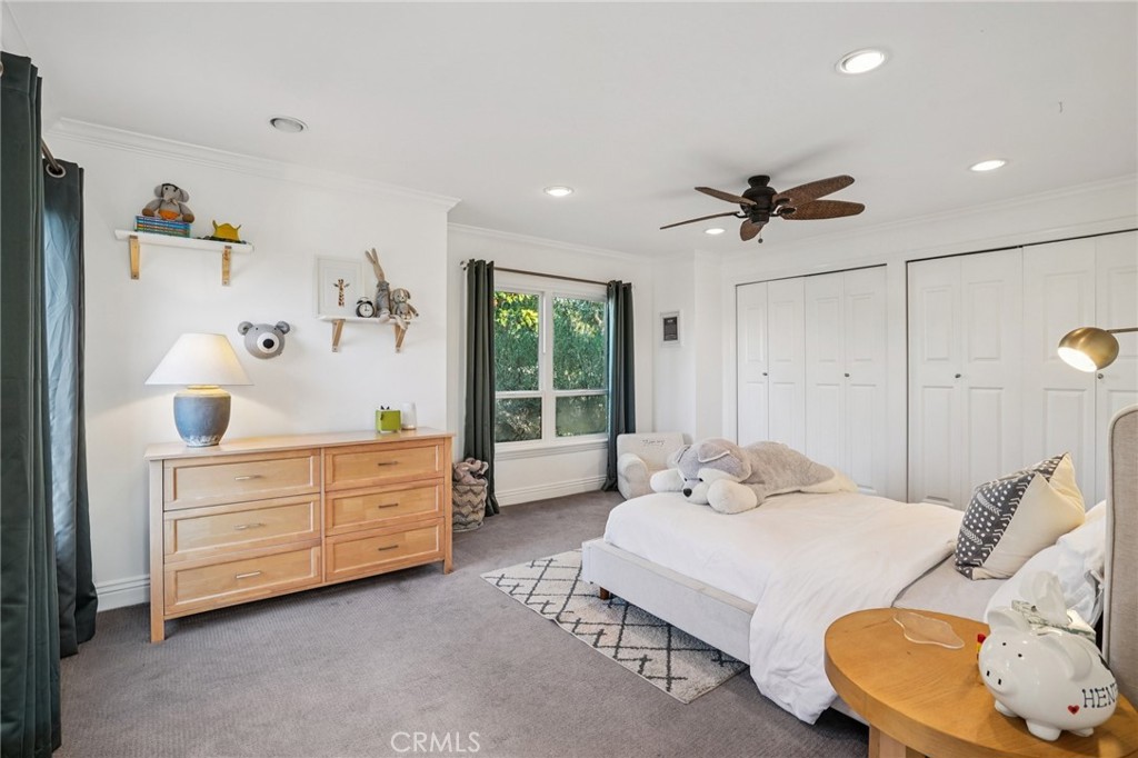1237 South Gertruda Avenue Redondo Beach, CA 90277 - Photo 24 of 52 a bedroom with a bed and a couch