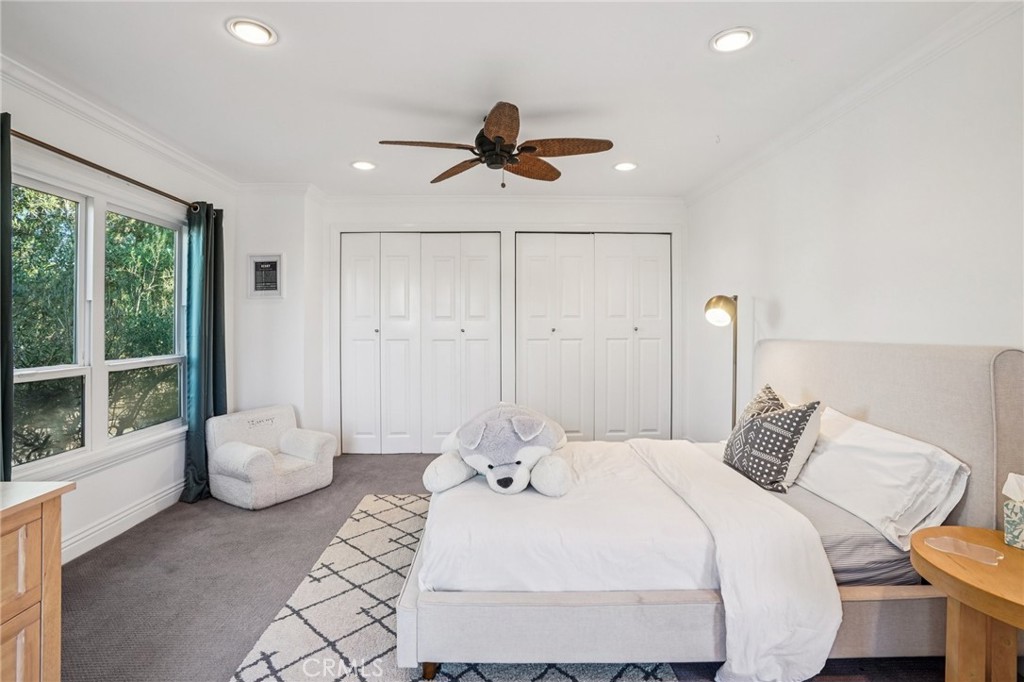 1237 South Gertruda Avenue Redondo Beach, CA 90277 - Photo 25 of 52 a bedroom with a bed and window
