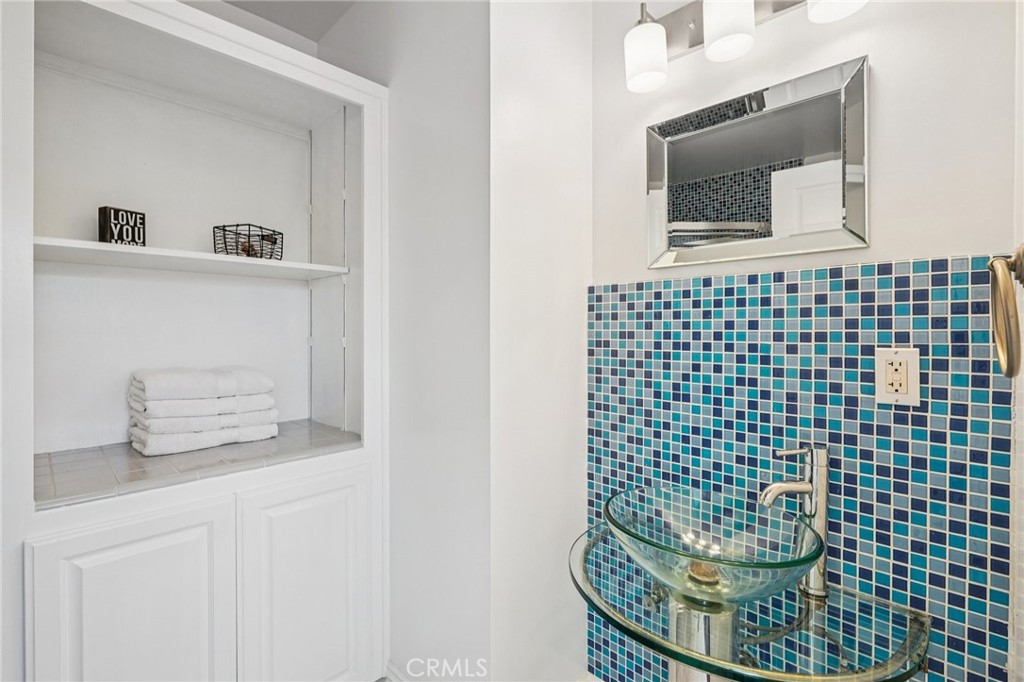 1237 South Gertruda Avenue Redondo Beach, CA 90277 - Photo 29 of 52 a bathroom with a sink a mirror and shower