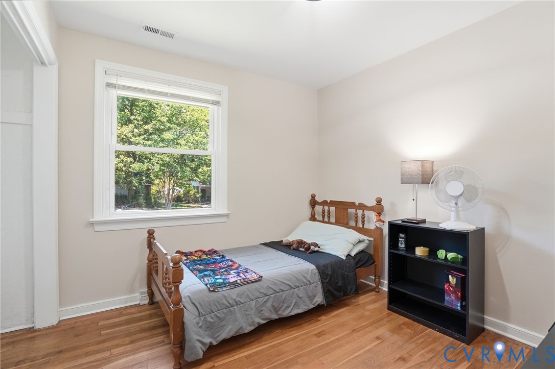 2403 Omega Road Henrico, VA 23228 - Photo 21 of 39 a bedroom with a bed and a window