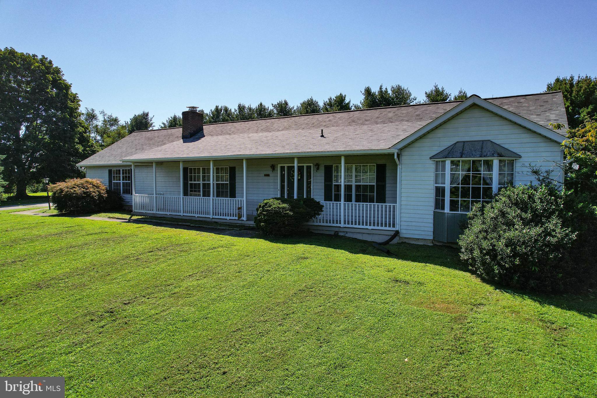 4709 Mt Carmel Road Hampstead, MD 21074 - Photo 31 of 44 a front view of a house with yard and green space
