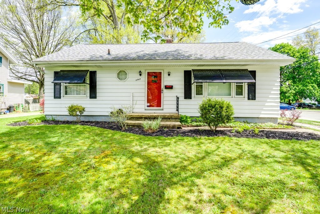 3569 Elm Road Stow, OH 44224 - Photo 1 of 17 White siding exterior with a vibrant red entry door