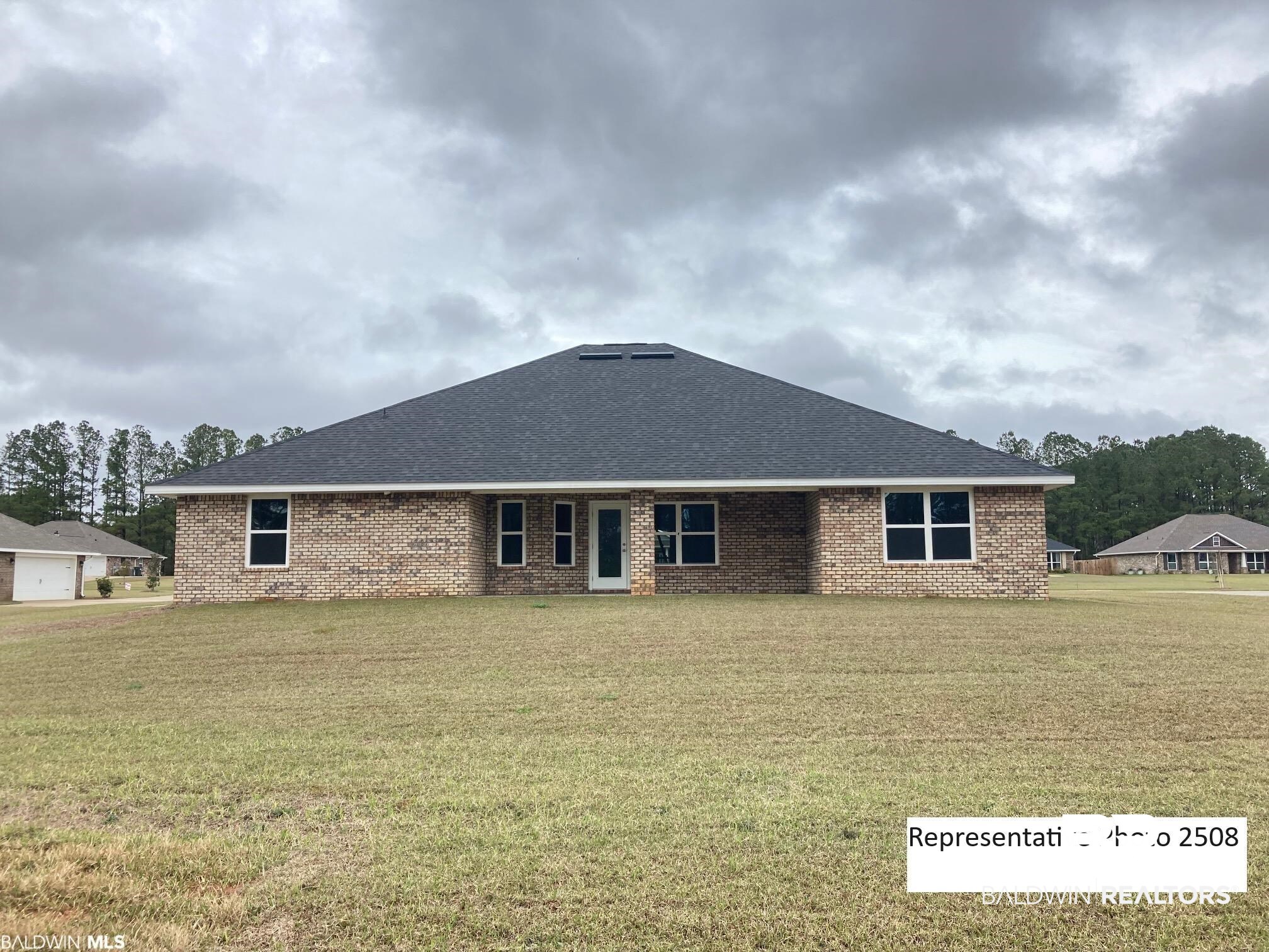 2201 Pollard Road Daphne, AL 36526 - Photo 15 of 15 View of front of property with a front yard