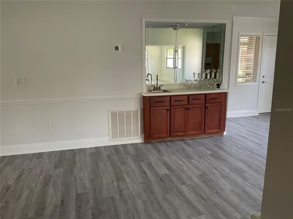 a view of a bathroom from a hallway