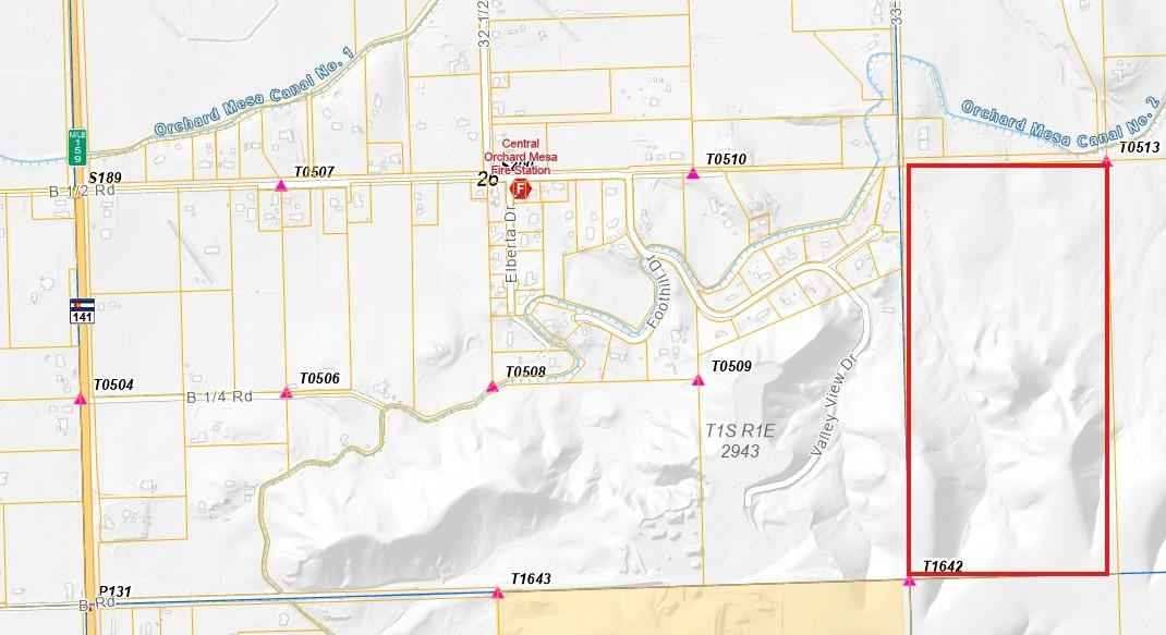 a view of a balcony with wooden floor