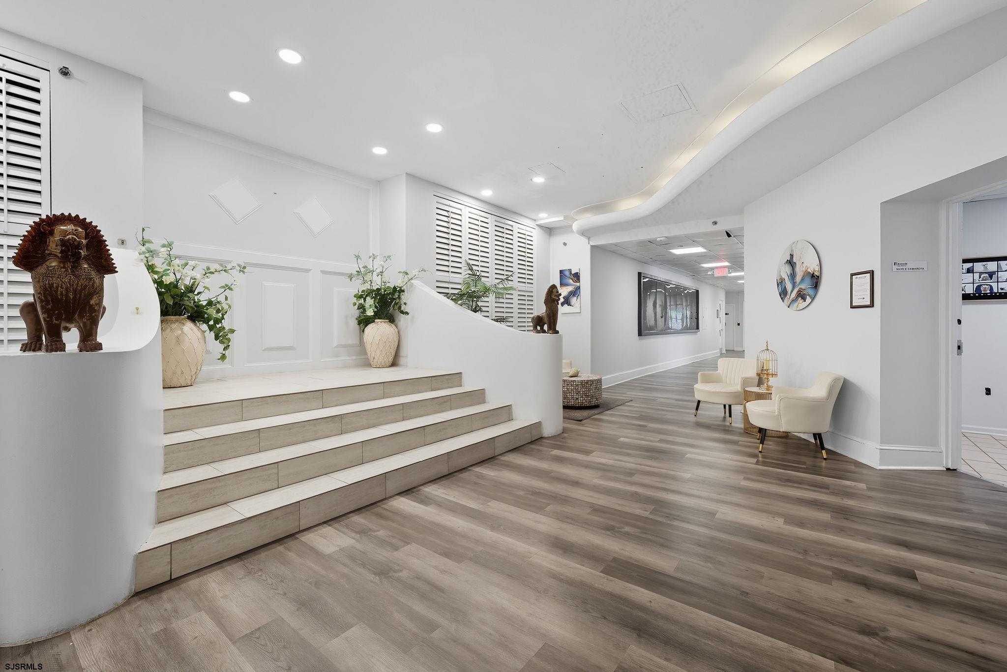 101 South Raleigh Avenue, Unit 809 Atlantic City, NJ 08401 - Photo 12 of 40 a living room with furniture and a table