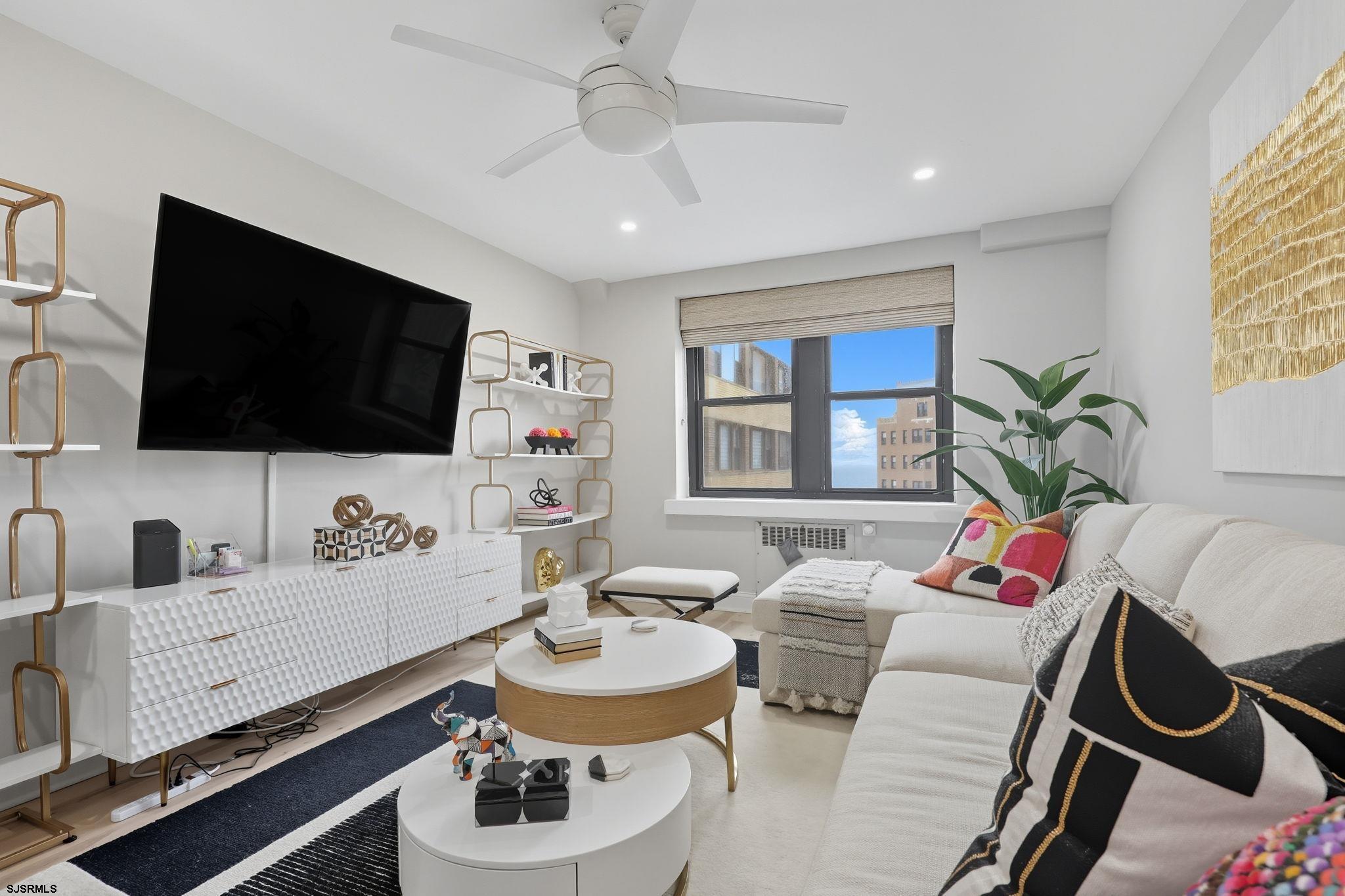101 South Raleigh Avenue, Unit 809 Atlantic City, NJ 08401 - Photo 13 of 40 a living room with furniture and a flat screen tv