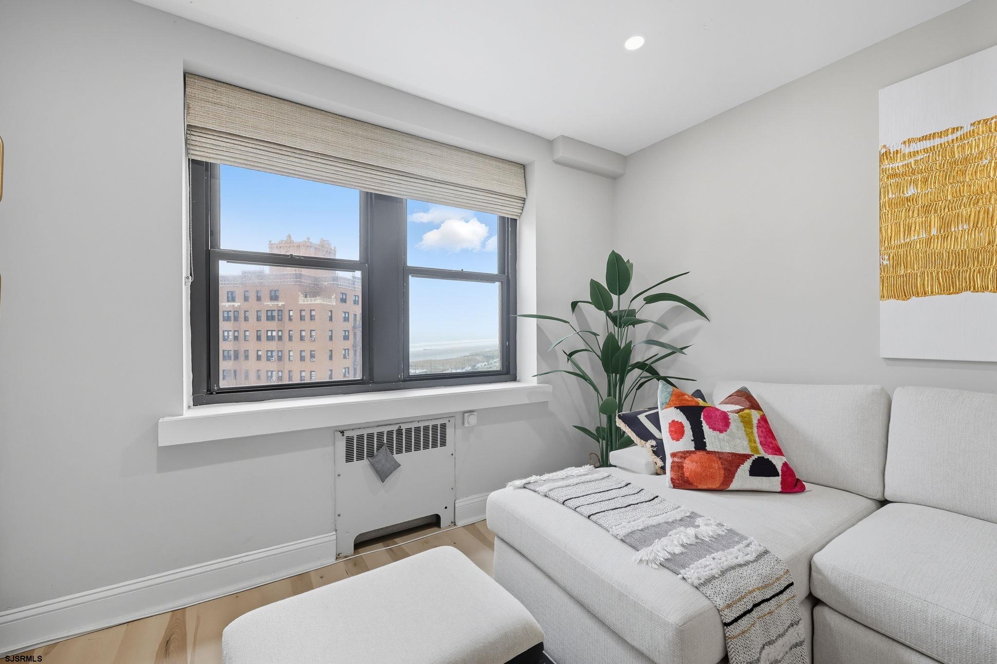 101 South Raleigh Avenue, Unit 809 Atlantic City, NJ 08401 - Photo 15 of 40 a bathroom with a sink and a window