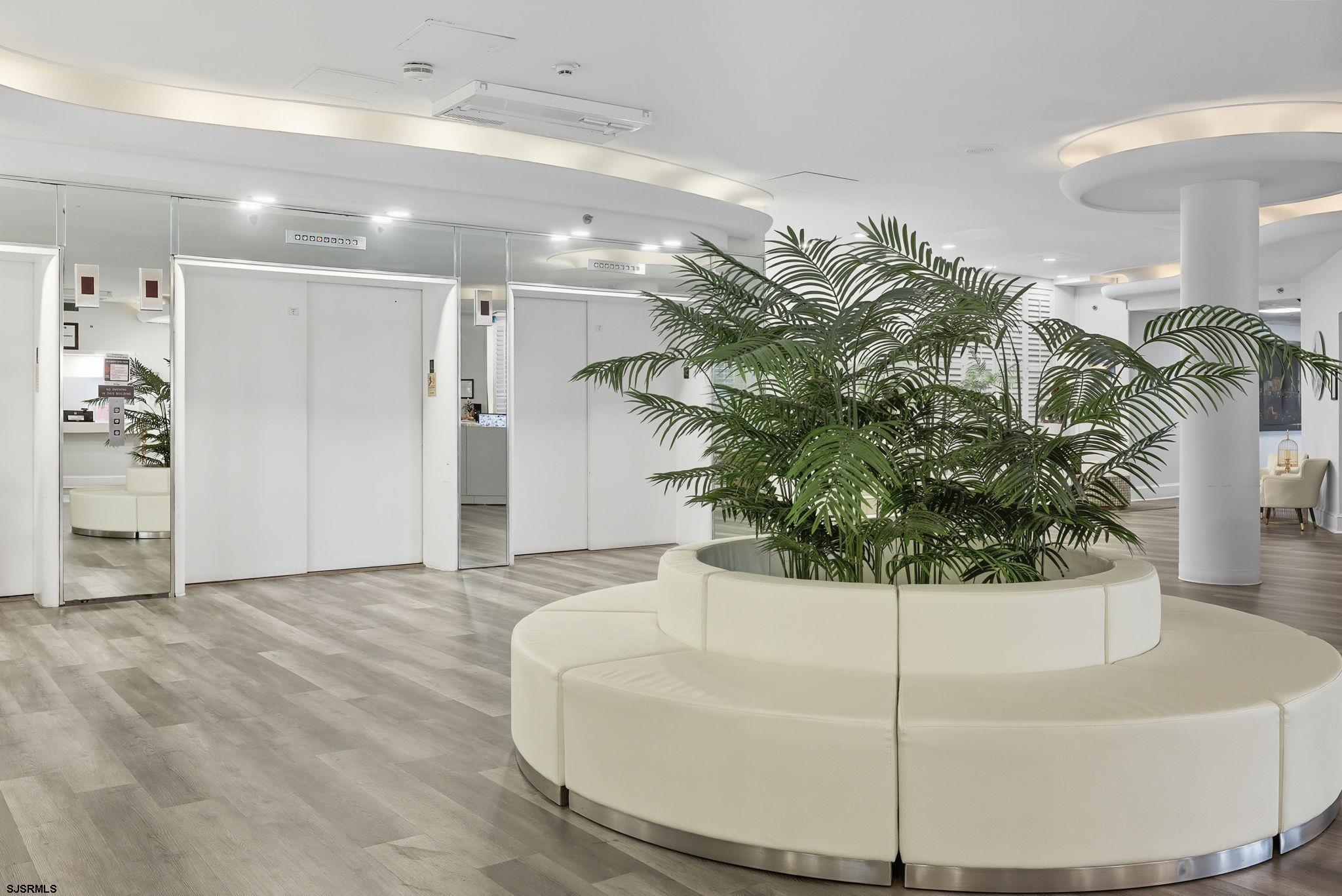 101 South Raleigh Avenue, Unit 809 Atlantic City, NJ 08401 - Photo 8 of 40 a white bath tub sitting in a bathroom