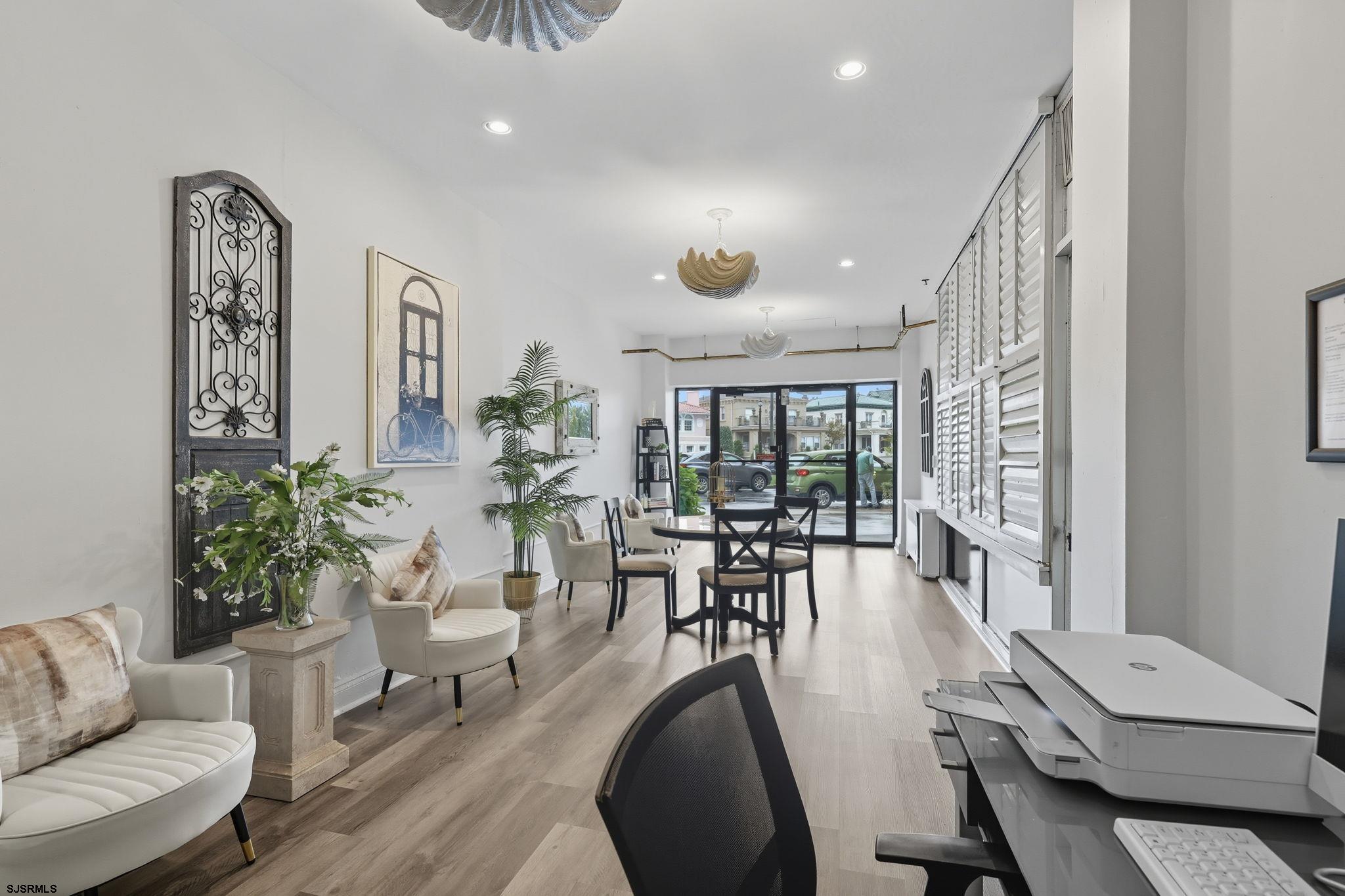 101 South Raleigh Avenue, Unit 809 Atlantic City, NJ 08401 - Photo 10 of 40 a living room with furniture and a large window