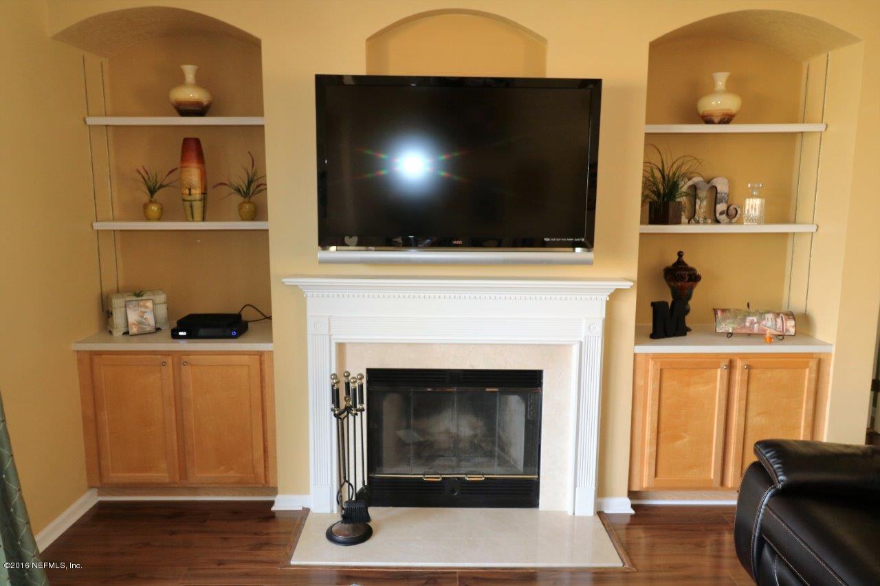 2132 Pond Spring Way Fleming Island, FL 32003 - Photo 8 of 48 Built-ins and Fireplace