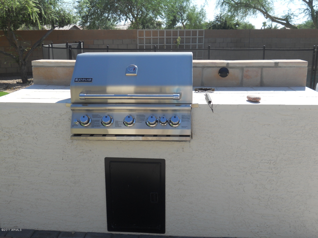 3847 East Cody Avenue Gilbert, AZ 85234 - Photo 22 of 26 Built in BBQ- JennAir - top of the line!