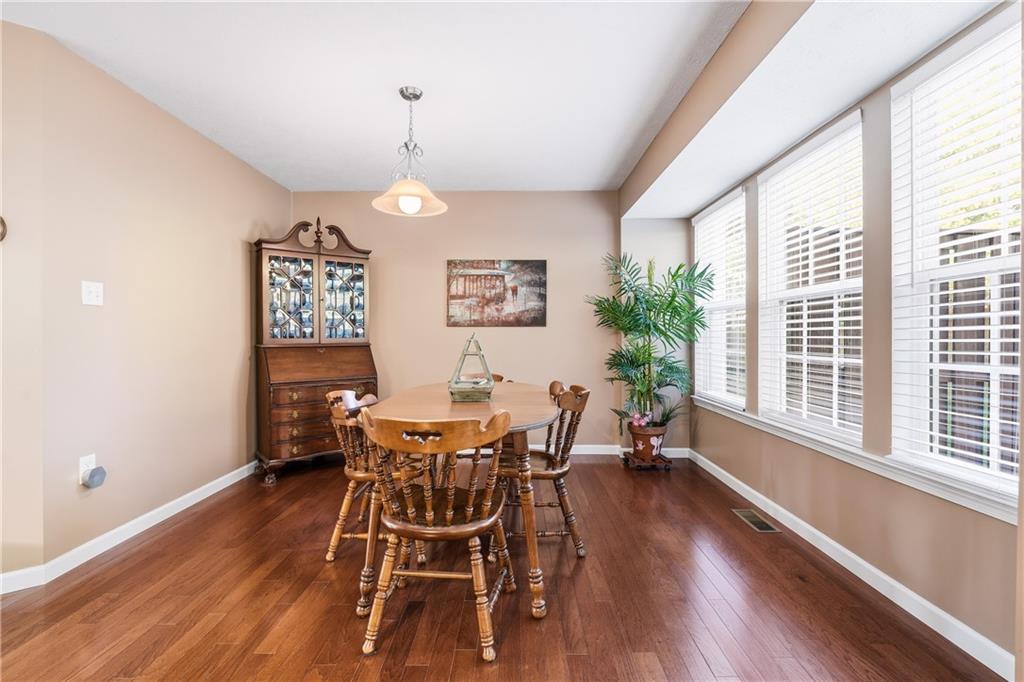 104 Broadstone Drive Mars, PA 16046 - Photo 7 of 30 a view of a dining room with furniture window and wooden floor