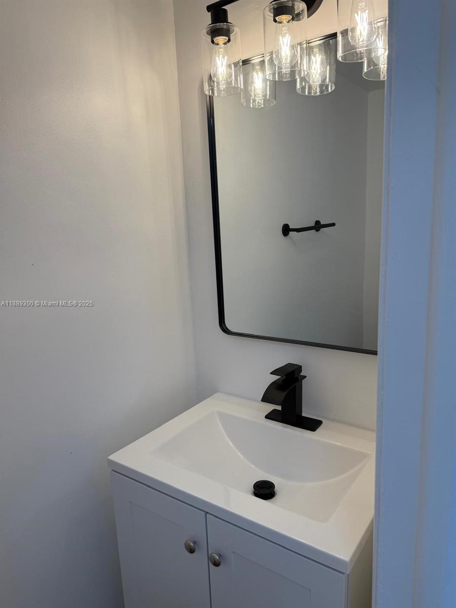 4163 Southwest 66th Terrace, Unit 108 Davie, FL 33314 - Photo 2 of 15 a close view of a sink