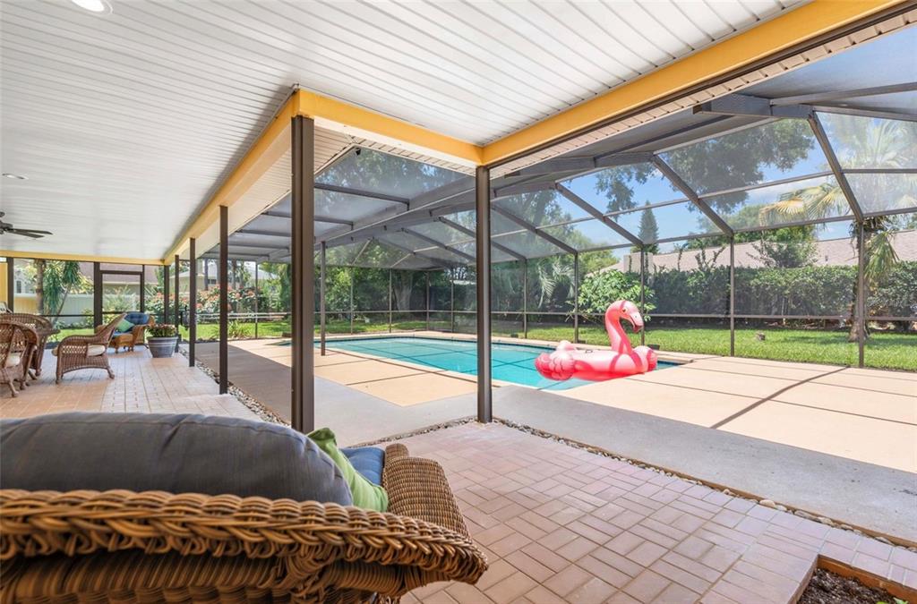 1255 Wisper Run Court Lutz, FL 33558 - Photo 17 of 25 a house view with a sitting space and garden view