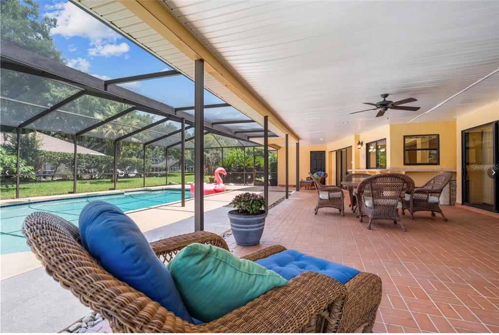 1255 Wisper Run Court Lutz, FL 33558 - Photo 18 of 25 a view of a livingroom with furniture and garden