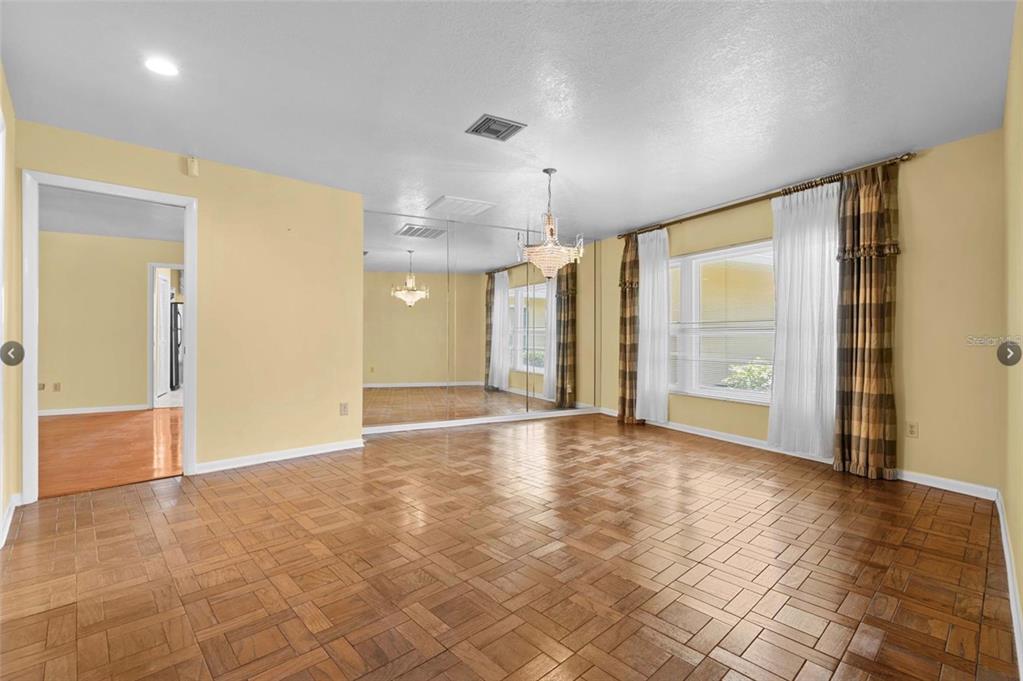 1255 Wisper Run Court Lutz, FL 33558 - Photo 4 of 25 a view of an empty room with a fireplace