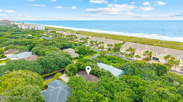 a view of a yard with an ocean