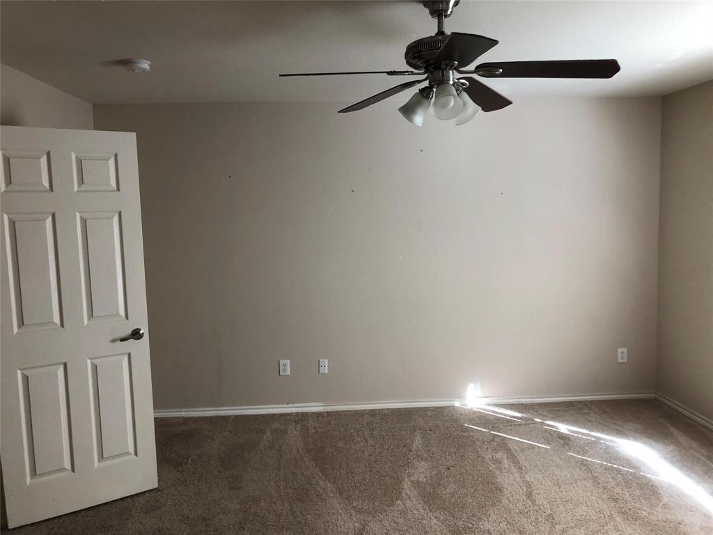 921 Parkplace Ridge Princeton, TX 75407 - Photo 9 of 12 a view of an empty room with a window