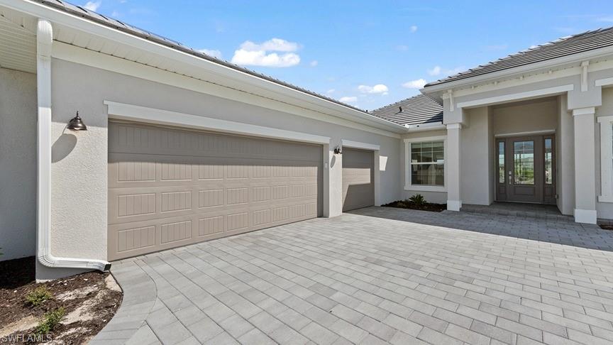 5406 Ternberry Road Ave Maria, FL 34142 - Photo 4 of 45 a view of a entrance to house