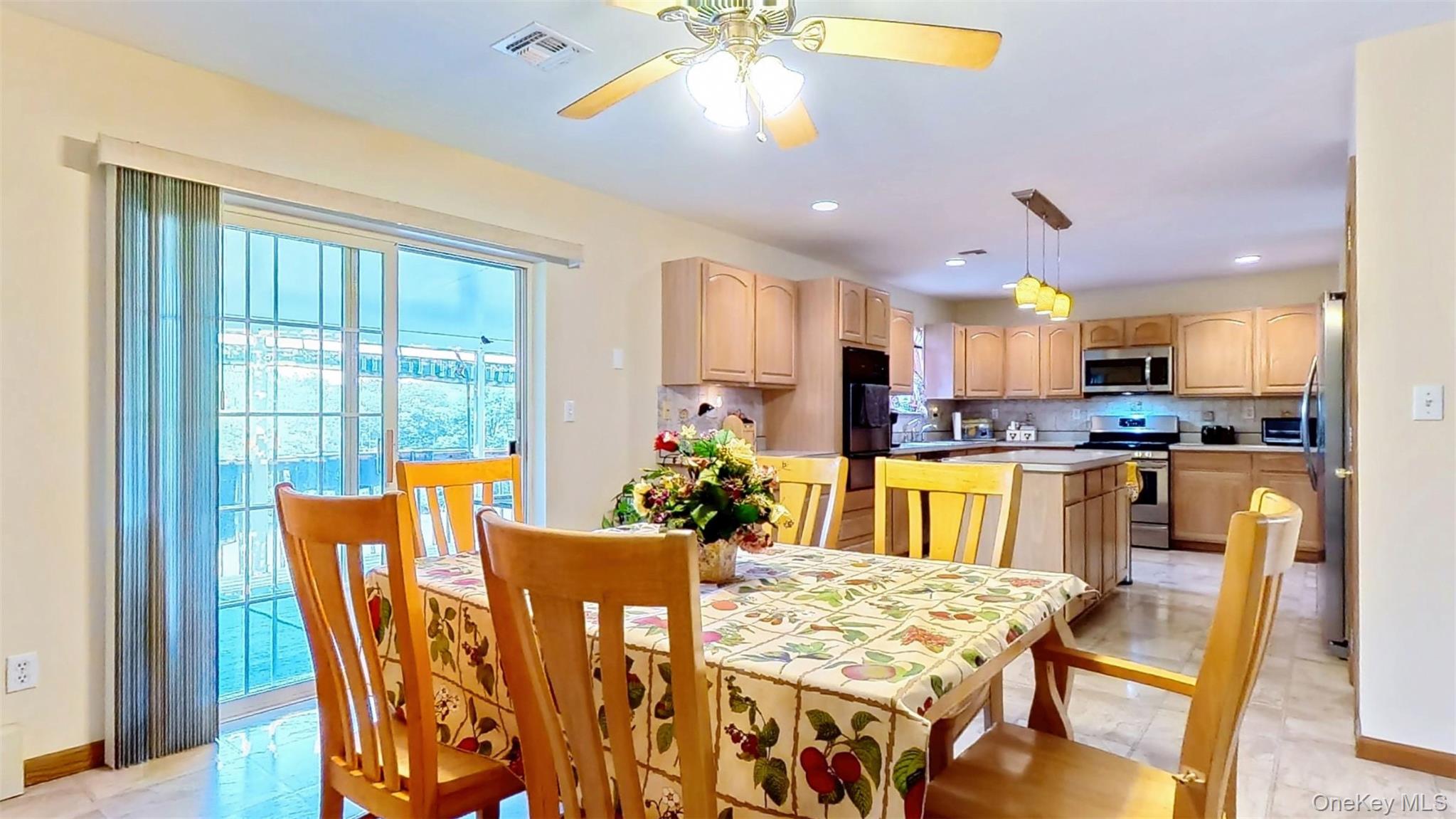 125 White Bridge Road Middletown, NY 10940 - Photo 11 of 43 Dining area with a ceiling fan, recessed lighting, and light tile patterned flooring
