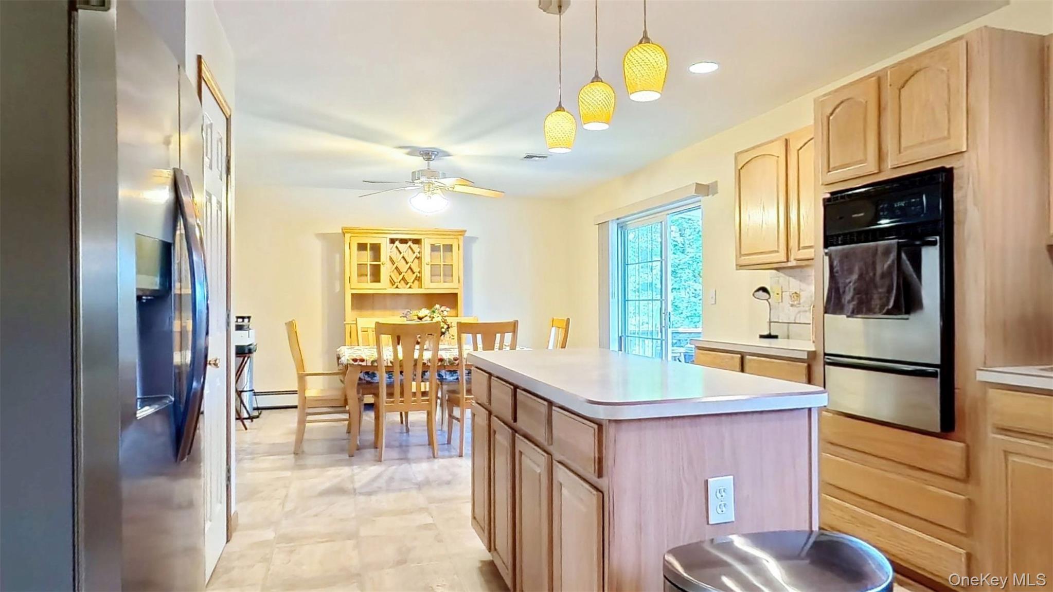 125 White Bridge Road Middletown, NY 10940 - Photo 17 of 43 Kitchen with stainless steel appliances, light brown cabinets, decorative light fixtures, light countertops, and recessed lighting