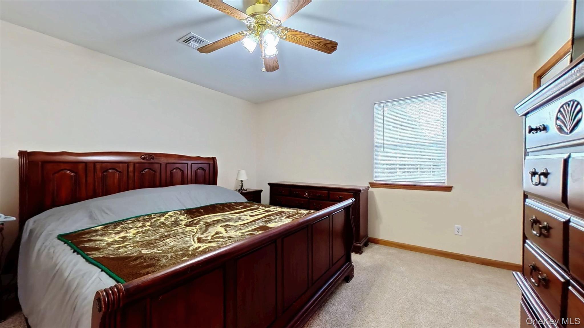 125 White Bridge Road Middletown, NY 10940 - Photo 24 of 43 Bedroom with light colored carpet and a ceiling fan