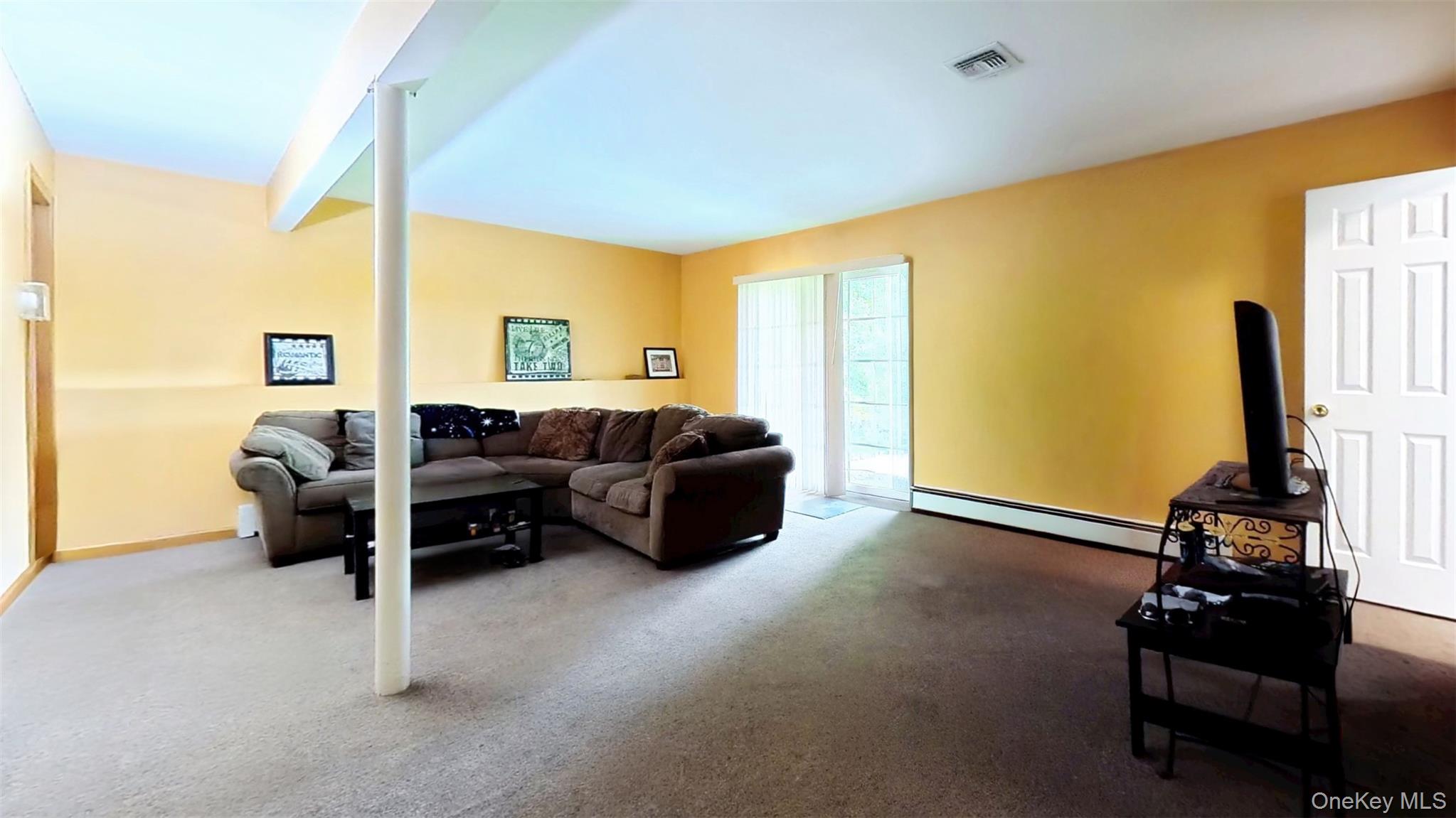 125 White Bridge Road Middletown, NY 10940 - Photo 33 of 43 Living room featuring carpet and baseboard heating