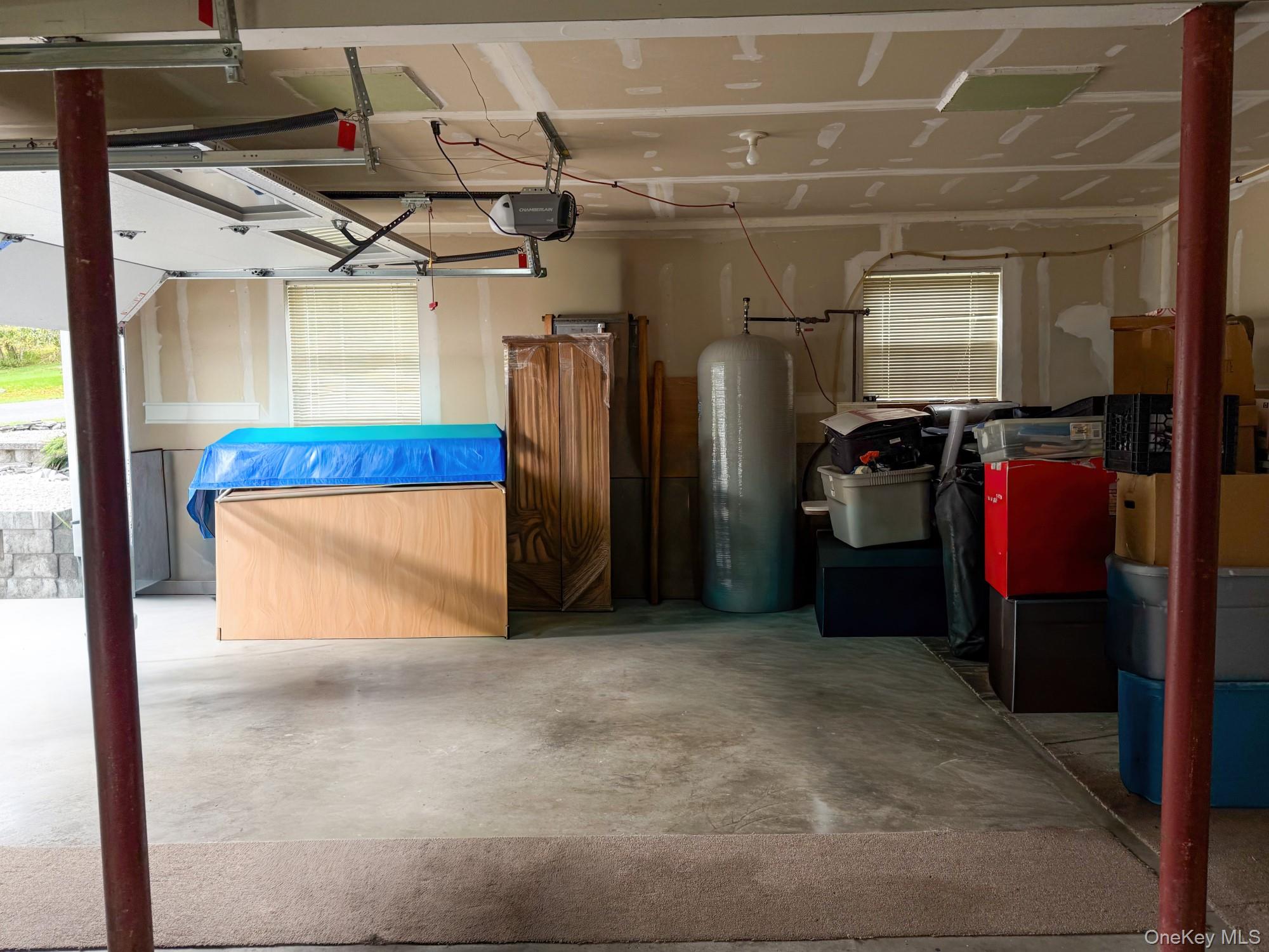 125 White Bridge Road Middletown, NY 10940 - Photo 40 of 43 Garage featuring a garage door opener