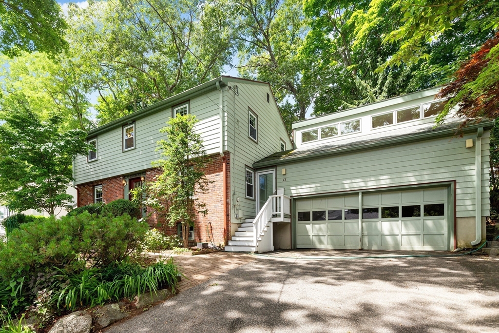 11 Tower Road Lexington, MA 02421 - Photo 1 of 33 a view of a house with a balcony