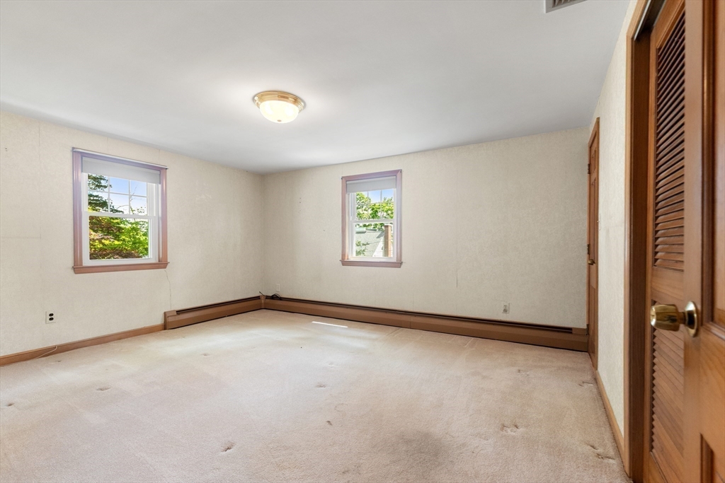 11 Tower Road Lexington, MA 02421 - Photo 13 of 33 an empty room with windows