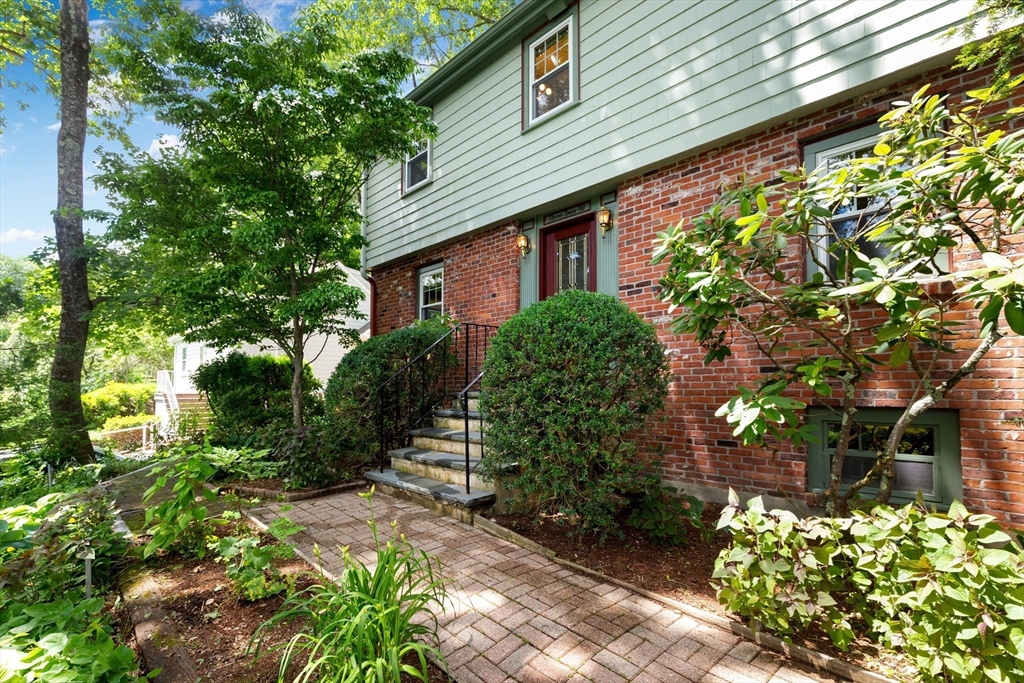 11 Tower Road Lexington, MA 02421 - Photo 2 of 33 a front view of a house with a yard