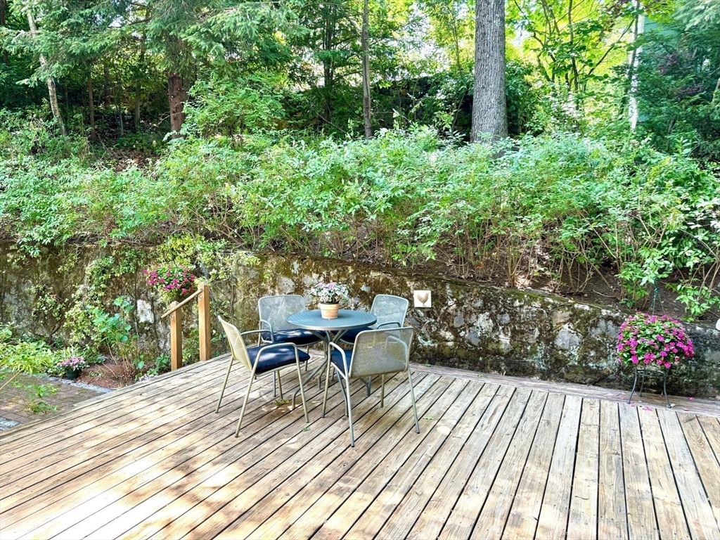 11 Tower Road Lexington, MA 02421 - Photo 30 of 33 a view of a terrace with furniture