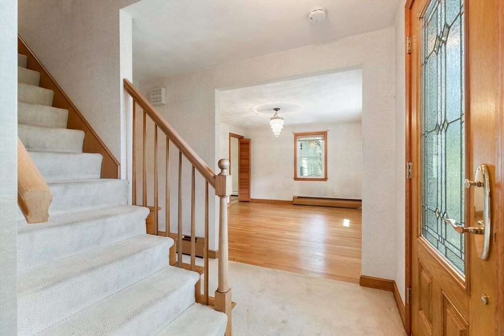11 Tower Road Lexington, MA 02421 - Photo 3 of 33 a view of entryway and hall with wooden floor