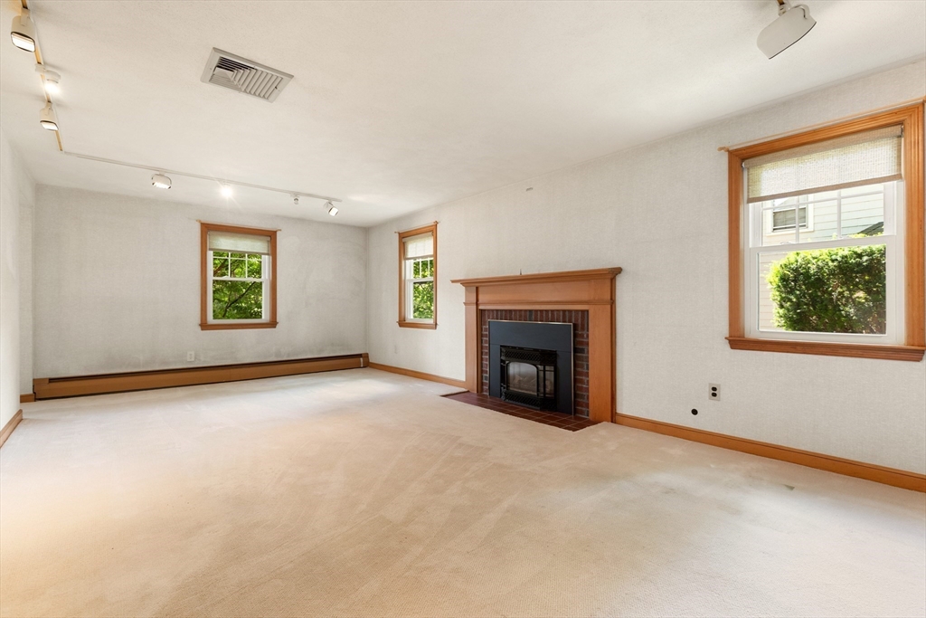 11 Tower Road Lexington, MA 02421 - Photo 4 of 33 an empty room with windows