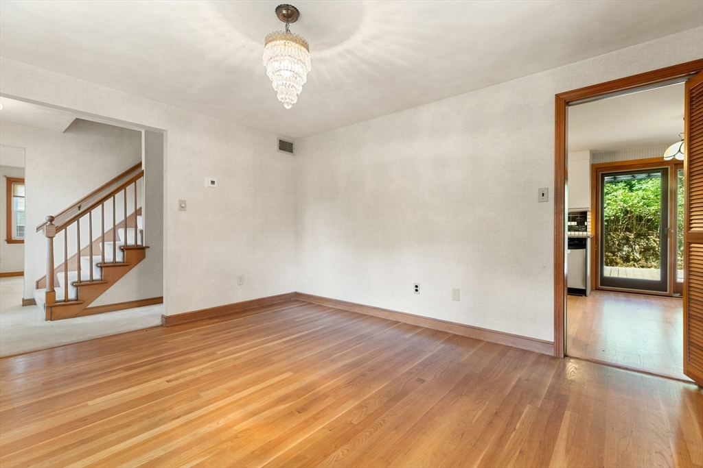 11 Tower Road Lexington, MA 02421 - Photo 7 of 33 a view of an empty room with wooden floor