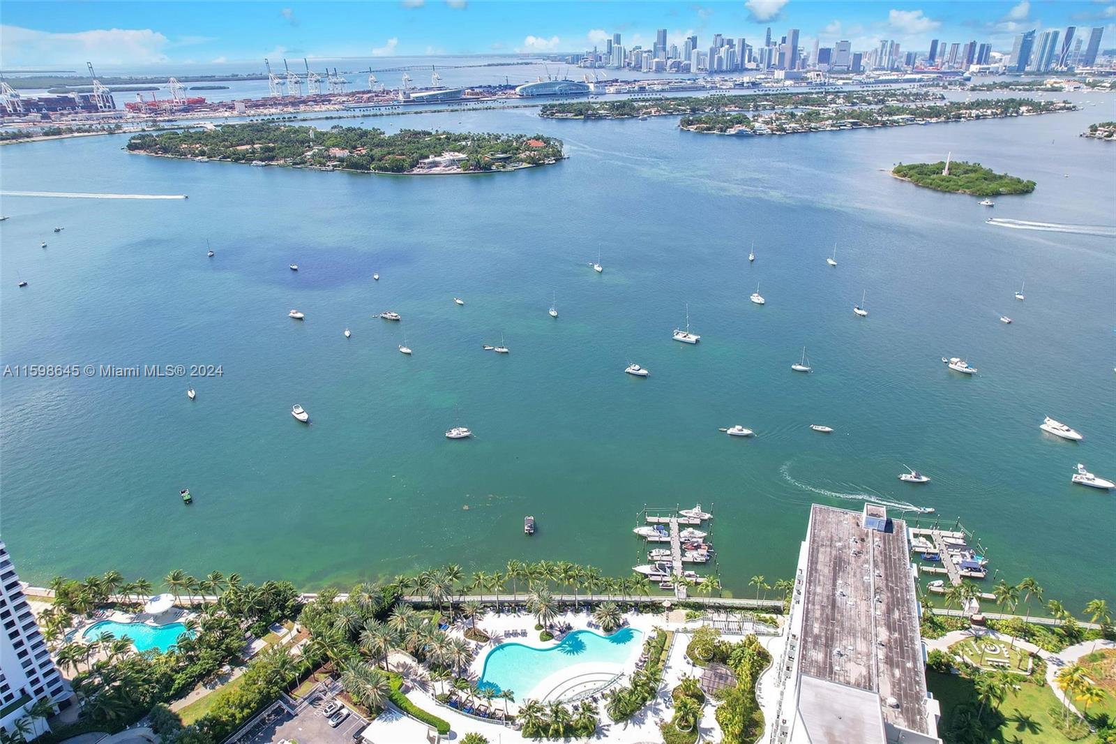 1500 Bay Road, Unit 608S Miami Beach, FL 33139 - Photo 2 of 8 a view of a lake with a city