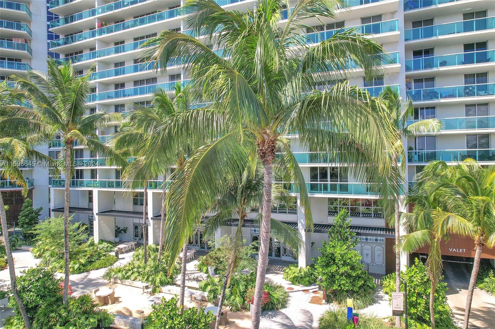 1500 Bay Road, Unit 608S Miami Beach, FL 33139 - Photo 6 of 8 front view of a multi story building