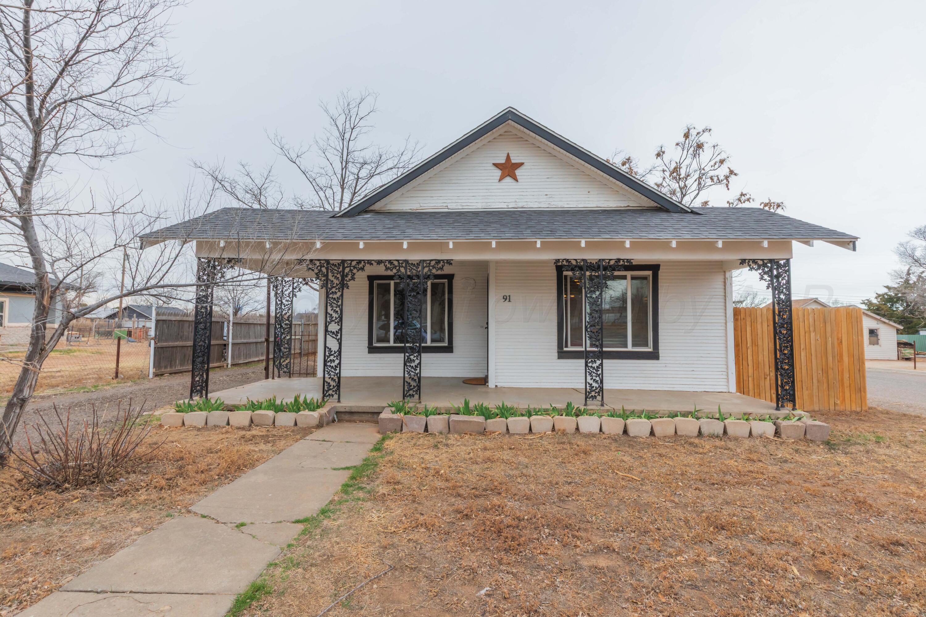 91 North Alabama Street Amarillo, TX 79106 - Photo 28 of 28 a front view of a house with a yard