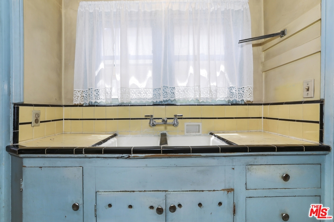 4053 Verdugo Road Los Angeles, CA 90065 - Photo 21 of 45 a close view of sink and tap