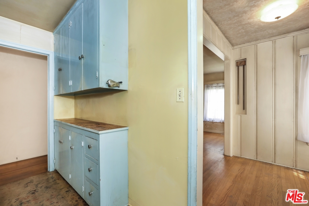 4053 Verdugo Road Los Angeles, CA 90065 - Photo 23 of 45 a view of cabinets with wooden floor